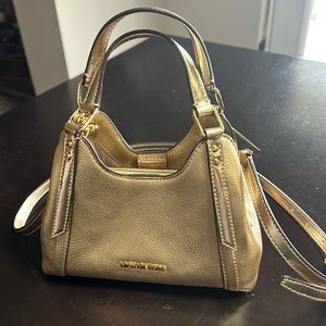 Michael Kora pale gold compact crossbody bag